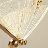 Suspension forme de papillon or et verre