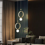 Suspension boule de verre et or avec anneau doré à LED au design moderne