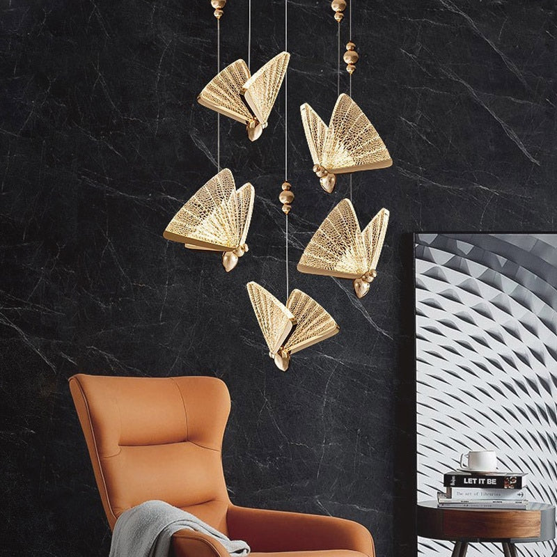 Suspension forme de papillon or et verre