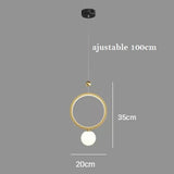 Suspension boule de verre et or avec anneau doré à LED au design moderne