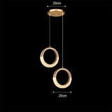 Suspension cercle doré et verre ondulé