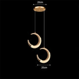 Suspension cercle doré et verre ondulé