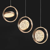 Suspension cercle doré et verre ondulé